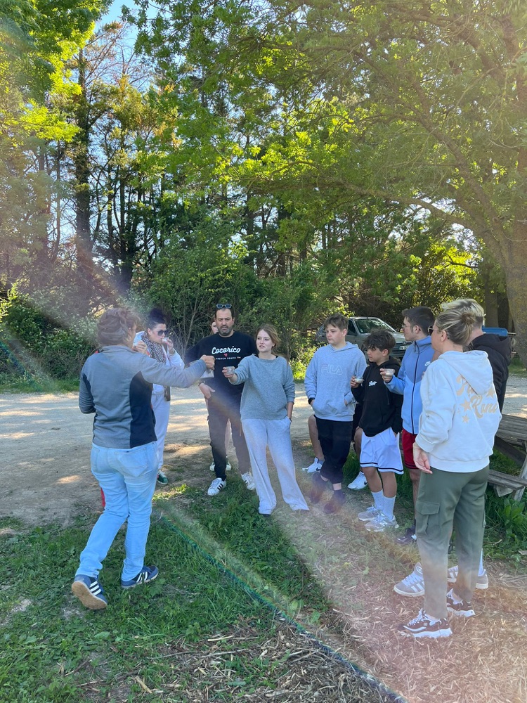Group enjoying an outdoor tasting after a bike ride in Provence